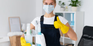 Woman cleaning the house